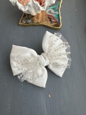 kaspinas segtukas pieno baltumo