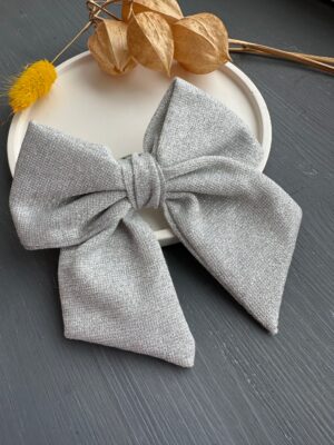 kaspinas segtukas sidabro spalvos